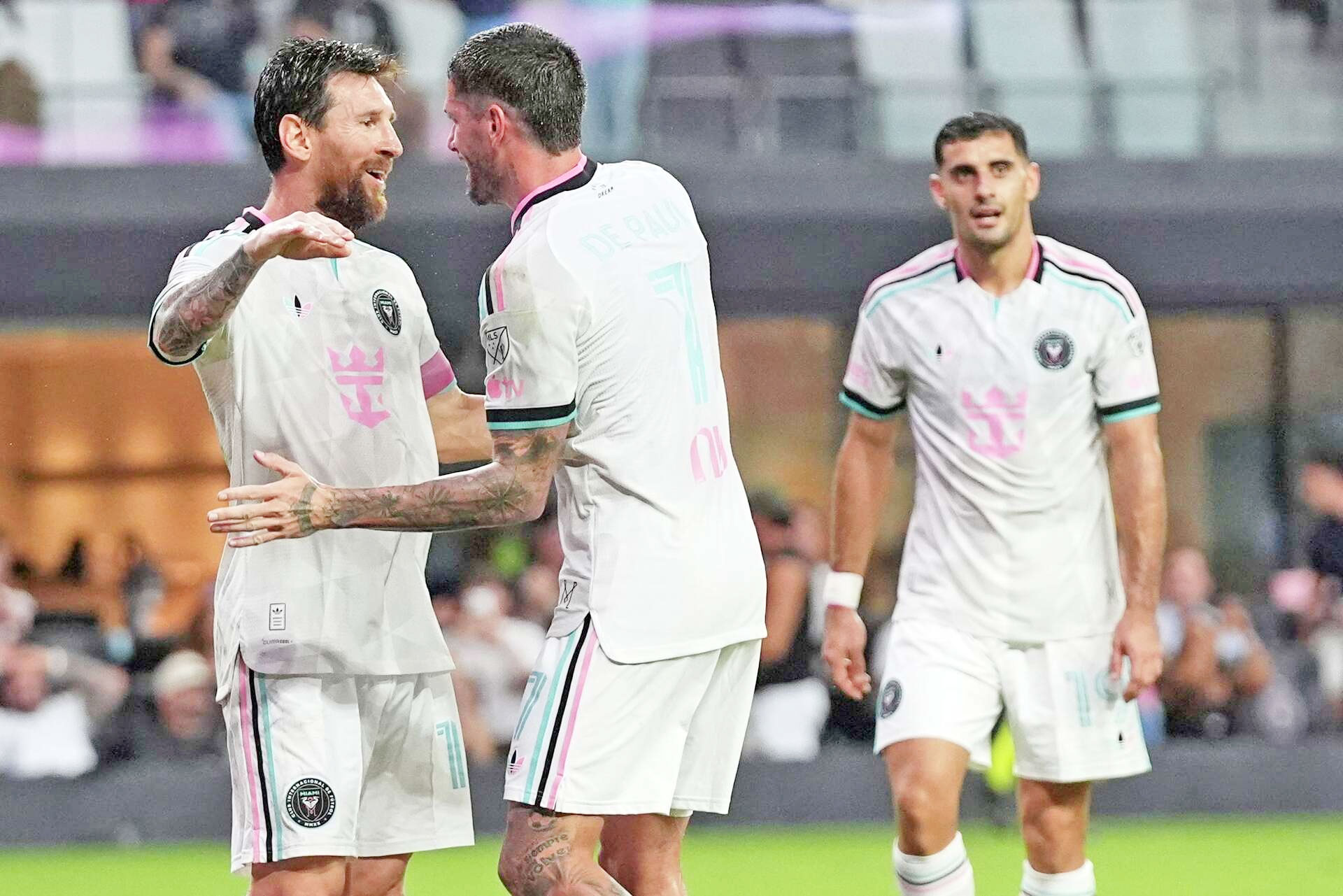 Messi leads Miami to playoff-clinching win